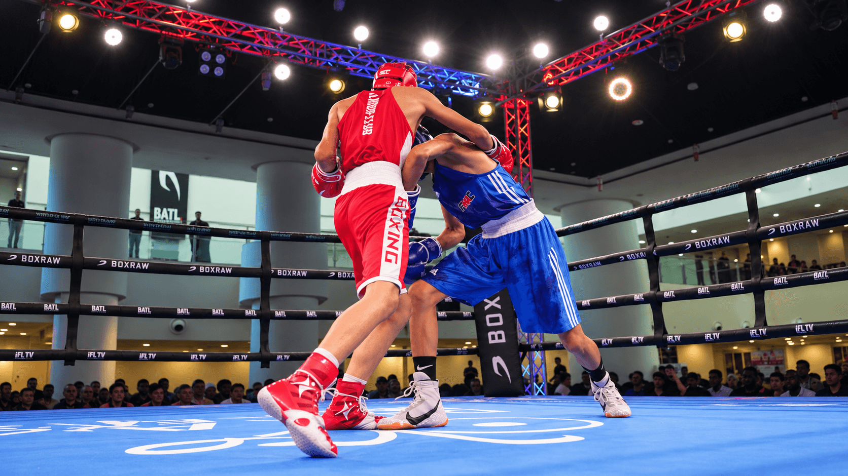 Boxers exchanging punches, with AI tracking overlays